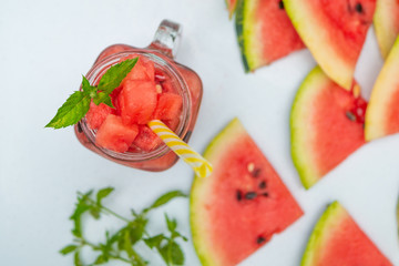 Summer watermelon drink. Summer Watermelon drink in glasses and slices of watermelon style flat lay 