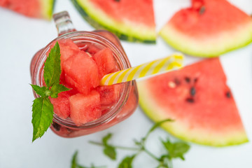 Summer watermelon drink. Summer Watermelon drink in glasses and slices of watermelon style flat lay 