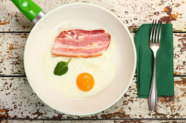 fried eggs with bacon