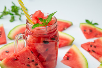 Summer Watermelon drink in glass and slices of watermelon 