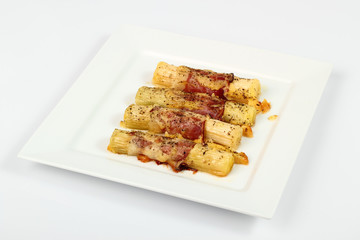 Cheesy leeks & ham. Isolated with clipping path.
