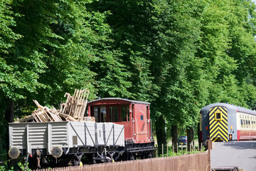 Steam engine victorian train station on old vintage railway in rural countryside uk