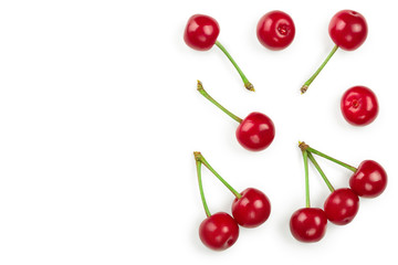 Some cherries with leaf closeup isolated on white background. With copy space for your text. Top view. Flat lay