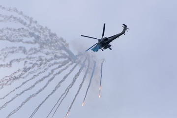 Military helicopters in sky