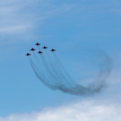 Six war jet planes in sky