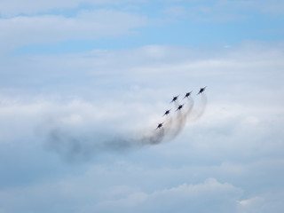 Six war jet planes in sky