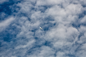 War jet plane among cloudscape