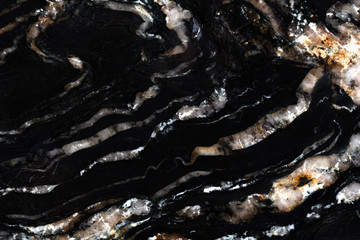 Exquisite black granite background as part of your stylish interior. High quality texture in...