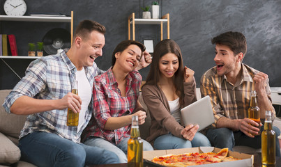 Group of friends making video call with their absent mate