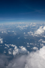 Fototapeta na wymiar beautiful sky and clouds from window of plane