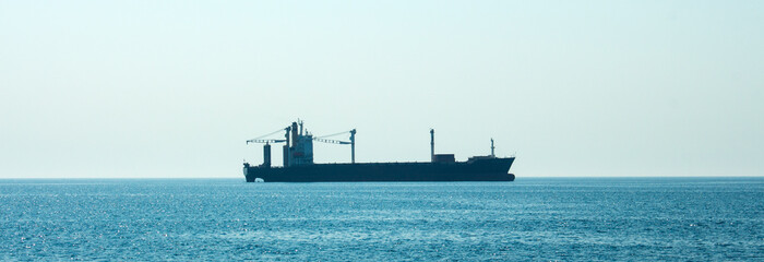 Panorama of Dry Cargo vessel.Transportation international delivery. Logistics and shipping. Sea transportation.