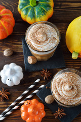 Spicy pumpkin latte decorated whipped cream