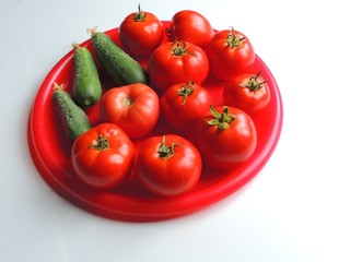 fresh tomatoes on a plate