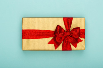 Christmas composition. Christmas golden glittering decorations on color background. Flat lay, top view, copy space - Image