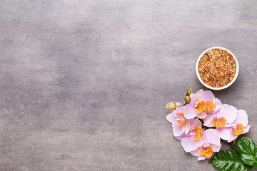 Orchid beauty flowers on vintage background. Spa background, spa therapy, beauty. Spa treatment.