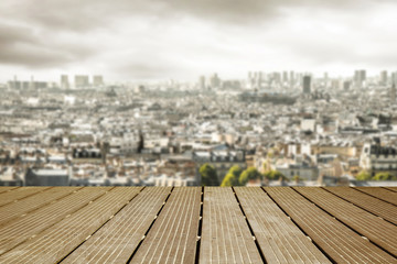 wooden walkway with a view of the city