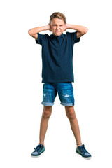 Full body of Little boy covering both ears with hands on white background