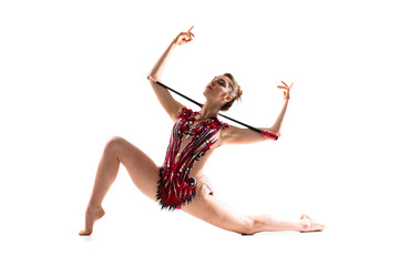 Obraz premium Girl doing rhythmic gymnastics with maces.