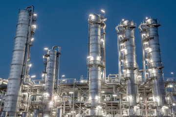 Oil refinery installation at night
