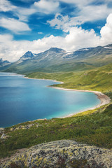 Fototapeta na wymiar Summer scenery in Jotunheimen national park in Norway, mountains and lake