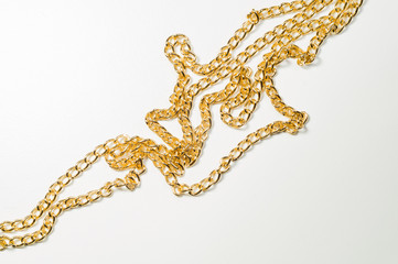 Golden chain isolated on white