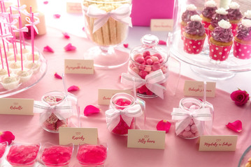 Various sweets on a lovely wedding candy bar
