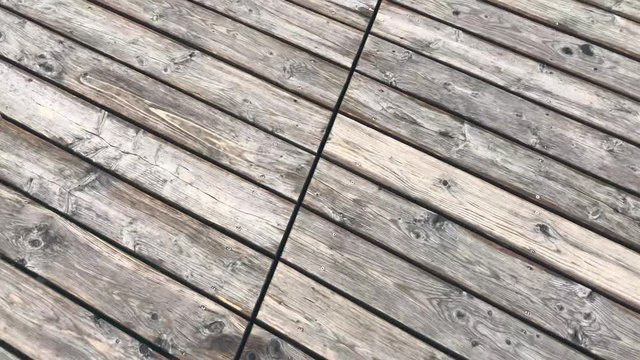 Walking on wooden pier on the Achensee lake on Pertisau, Tirol, Austria