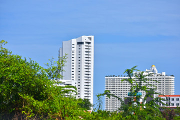 : Looking from the height See a city in a tight city with tall buildings and beautiful skies. Is a comfortable view