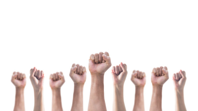 Hands with clenched fist of people crowd (men and women) isolated on a white background with clipping path for social justice and human rights concept