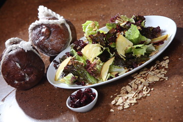 Salad with spinach, green apples and walnuts with sweet dressing.