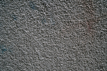 Stucco wall. Texture wall covering, background. Outer wall on the street.