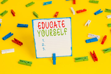 Handwriting text Educate Yourself. Conceptual photo prepare oneself or someone in a particular area or subject Colored clothespin papers empty reminder yellow floor background office