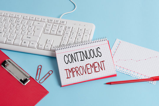 Writing note showing Continuous Improvement. Business concept for ongoing effort to improve products or processes Paper blue keyboard office study notebook chart numbers memo
