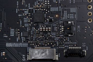 Close up of an electric circuit board. Microelectronics engineering technology