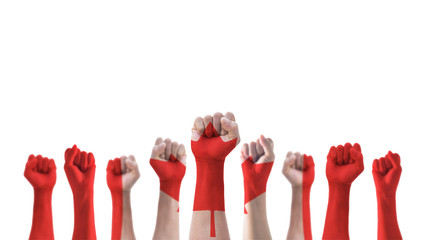 Labour day celebration with Canada national flag pattern on Canadian people clenched fist hand...