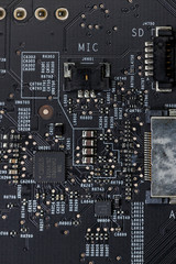 Close up of an electric circuit board. Microelectronics engineering technology