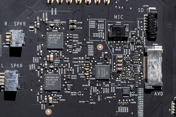 Close up of an electric circuit board. Microelectronics engineering technology
