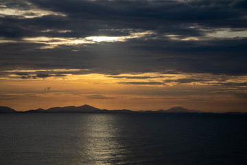 Sunset sea and mountain