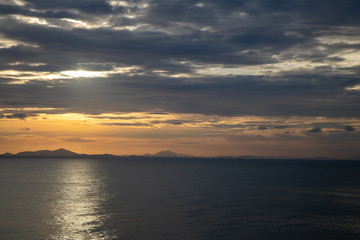Sunset sea and mountain