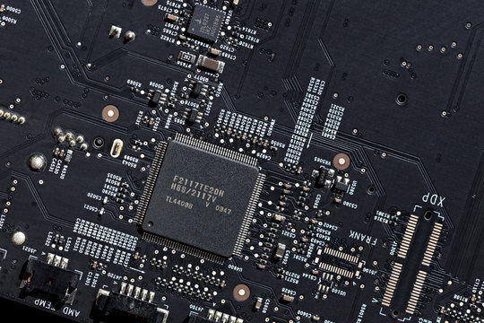 Close up of an electric circuit board. Microelectronics engineering technology