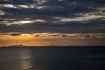 Sunset sea and mountain