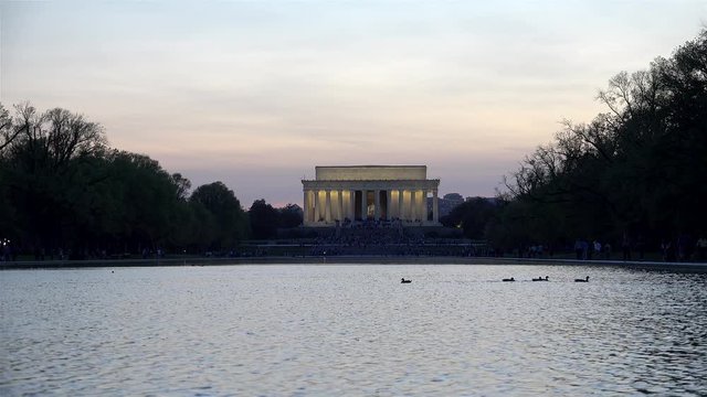 Reflecting Pool with the Lincoln Memorial at dusk. Washington, D.C., USA.