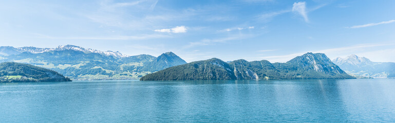 Panorama of the lake and mountains of the Alps in Switzerland.