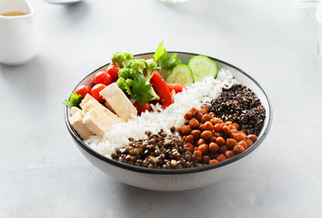 Healthy balanced food concept Buddha bowl with chicken steak, beans and vegetables