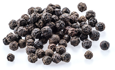 Black peppercorns isolated on white background.