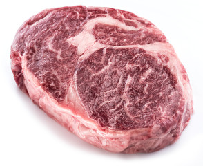 Raw Ribeye steak or beef steak isolated on white background.