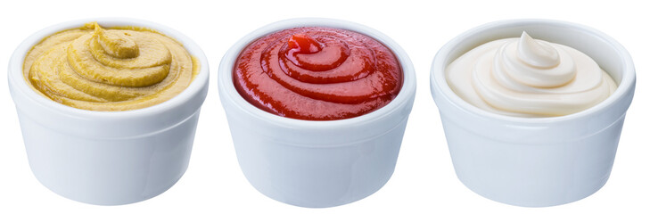 Mayonnaise, mustard and tomato sauces in white bowls. Clipping path.