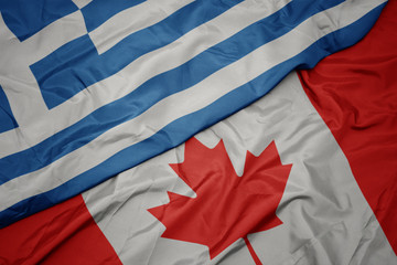 waving colorful flag of canada and national flag of greece.