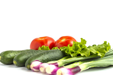 Set of fresh vegetables isolated on a white background.