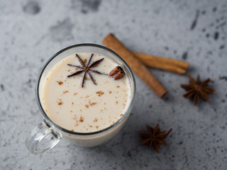 Masala tea in a glass Cup on the table